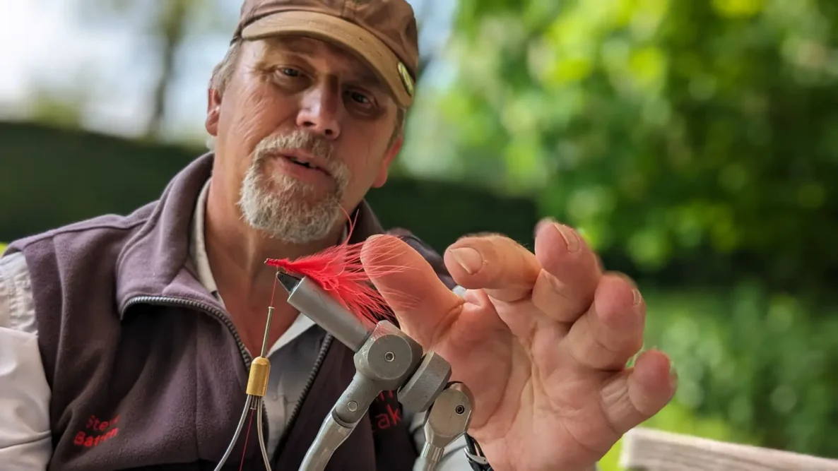 Making a fly on fishing breaks on the River Test