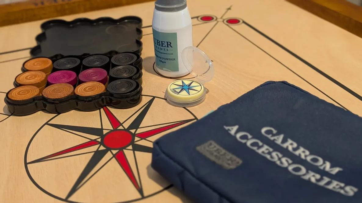 Carrom board and accessories